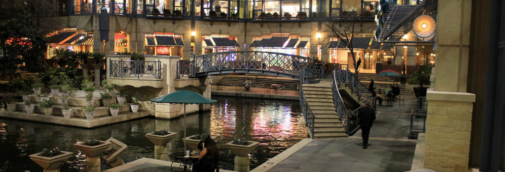 mall  terrace with water and people walking